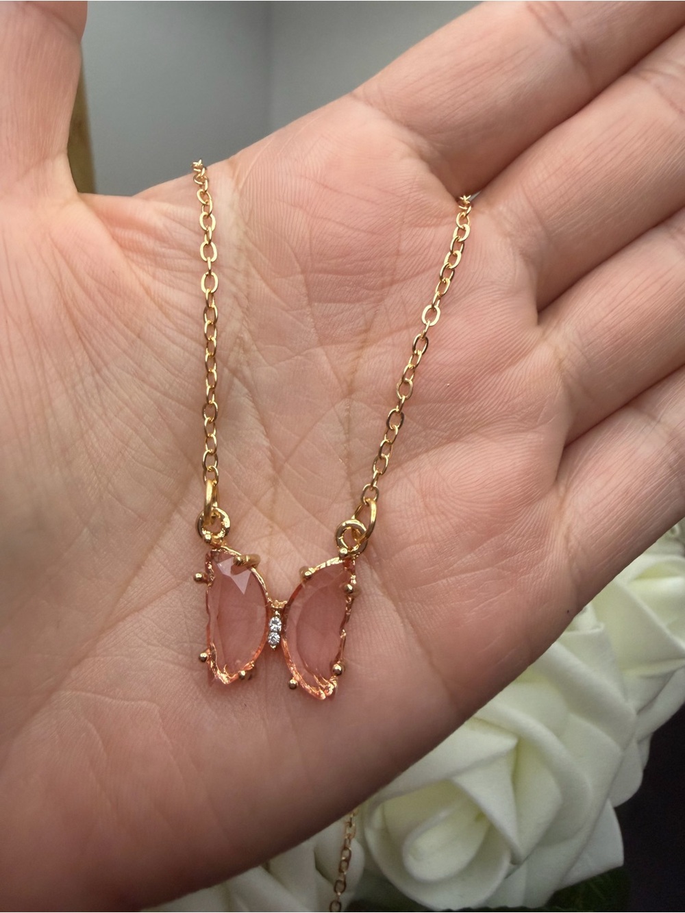 Gold Butterfly Necklace with Pink Gemstones